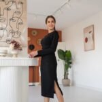 Elegante zwarte midi-jurk met split